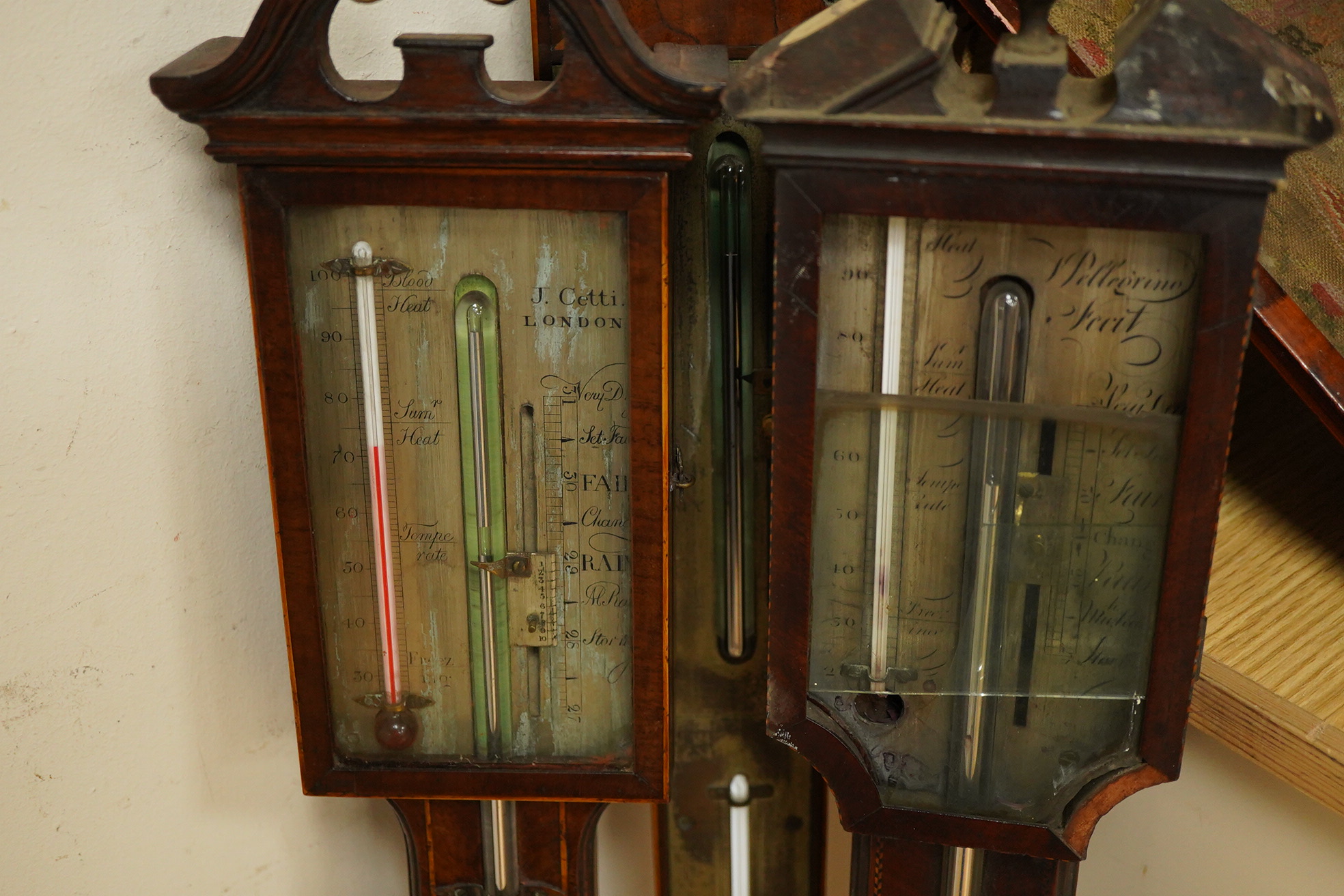 Three 19th century inlaid stick barometers to include one inscribed J. Cetti, London - some damage